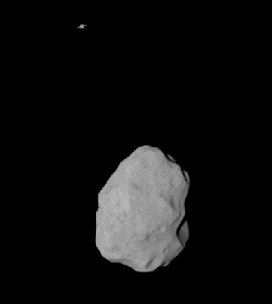 Asteroid Lutetia, with Saturn in the background