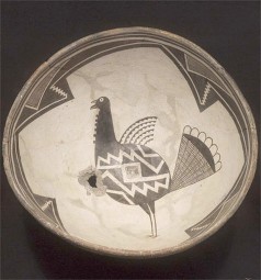 An ancient bowl features a turkey